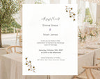 Orange floral wedding invitation template with botanical flowers and minimalist typography for an elegant garden or fall wedding